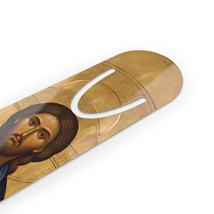 Close-up angle of Sacred Heart of Jesus bookmark and rounded page clip