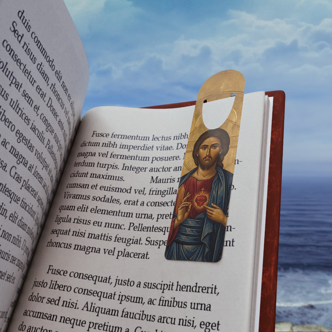 Sacred Heart of Jesus bookmark placed in an open book