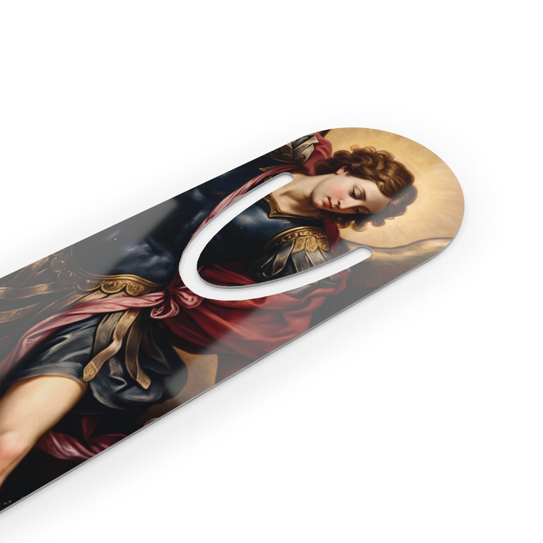 Angled close-up of St. Michael bookmark and rounded page clip
