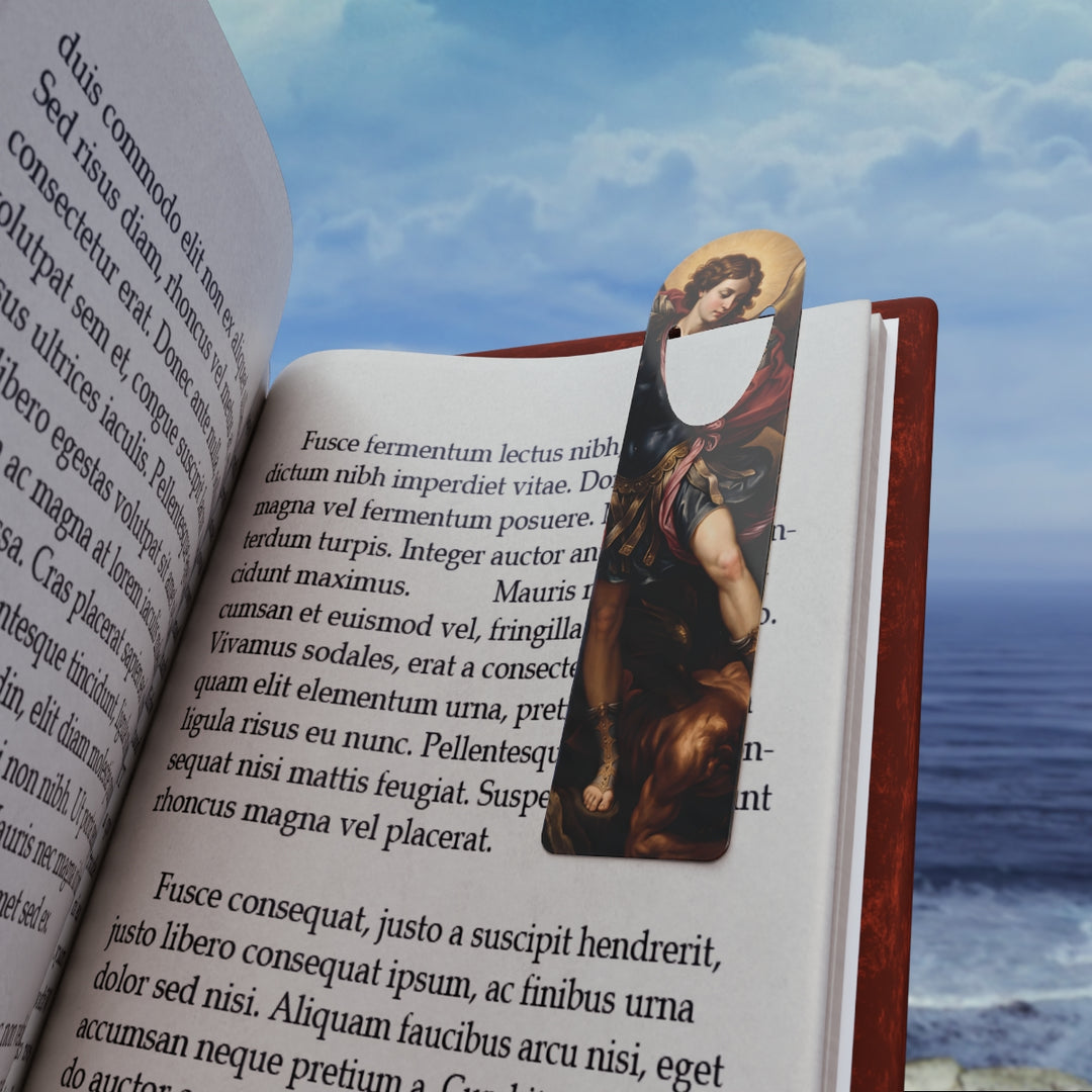 St. Michael bookmark marking a page in an open book